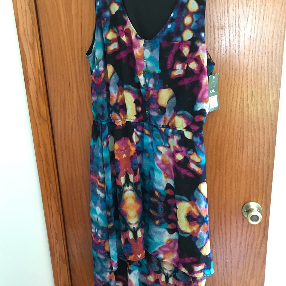 Plus size sleeveless black floral high low dress.